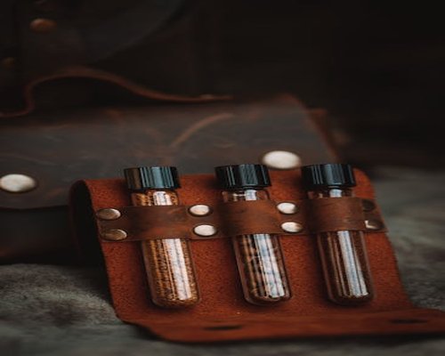 Old glass laboratory equipment and vintage vials